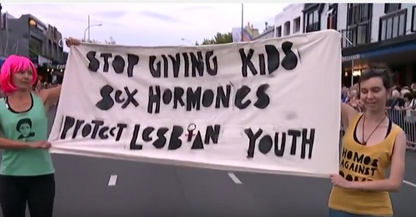 Feminists Interrupt at Auckland Pride Parade – “Stop giving kids sex hormones”